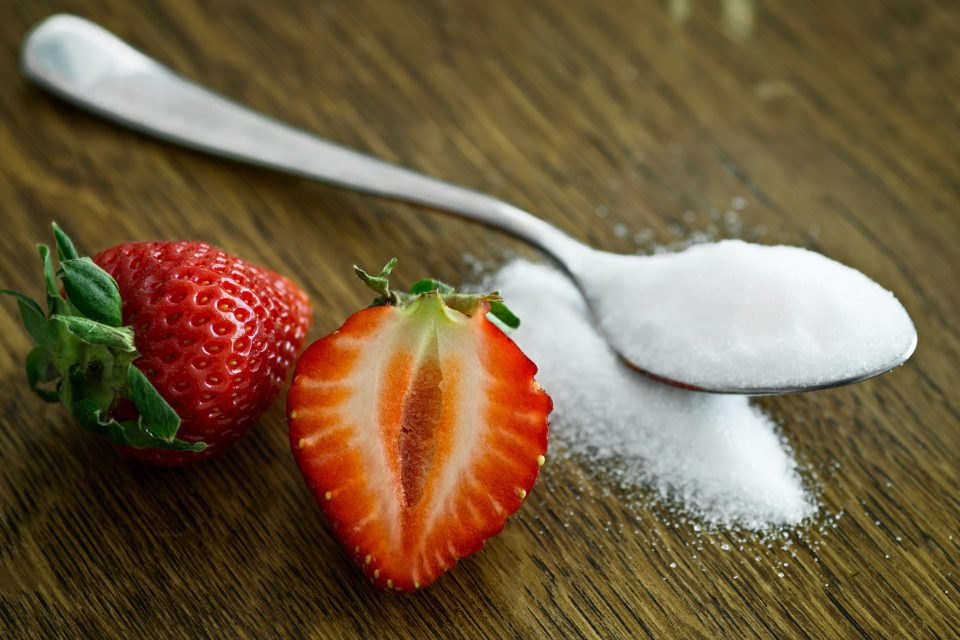 Types of Sugar on Spoon with Berry