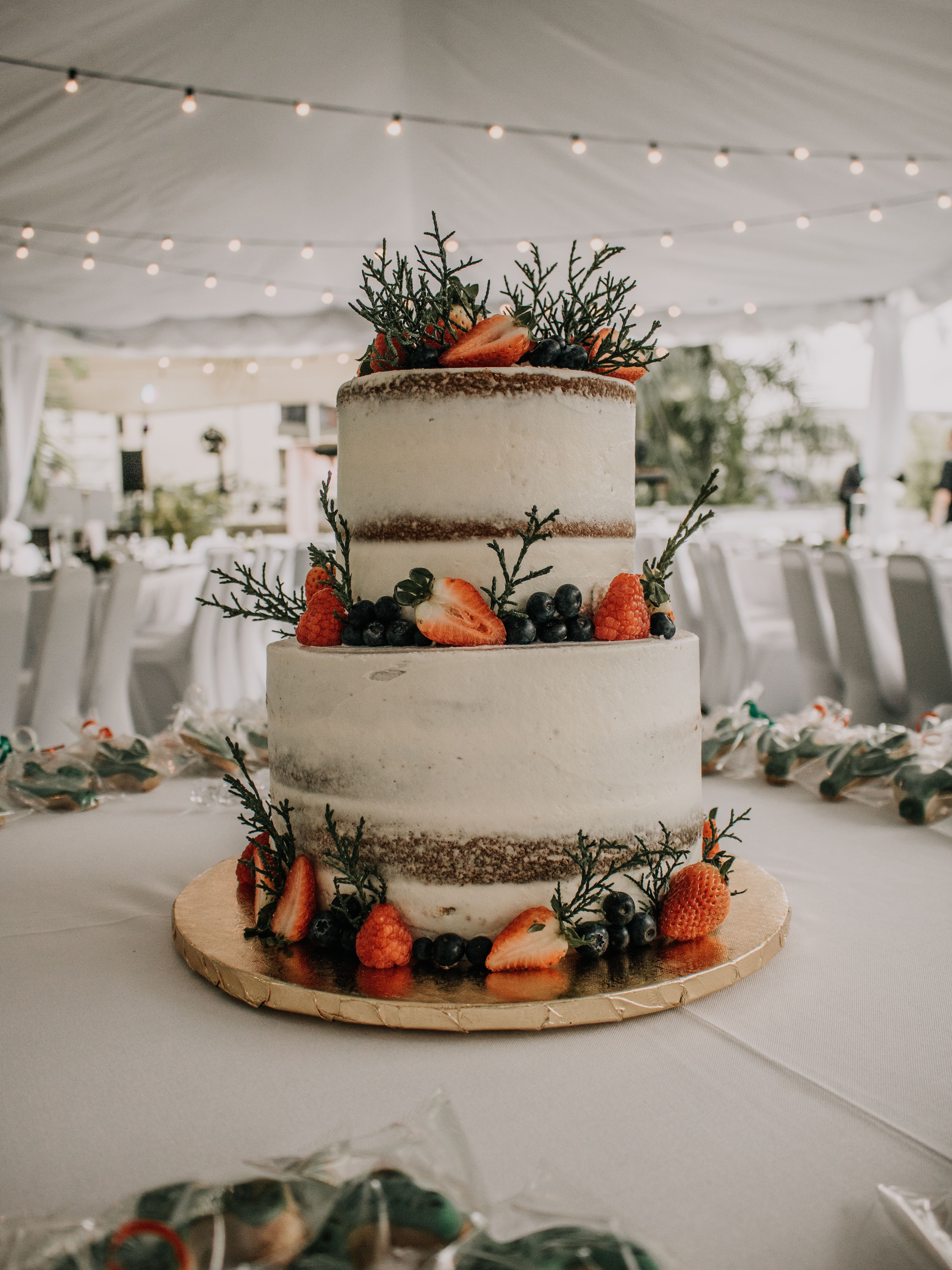 double layer wedding cake with fruit decorations